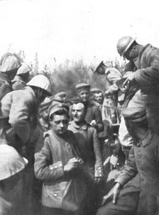Pendant l'action; Les premiers prisonniers du premier jour: de tres jeunes gens 1916 (1924) Creator: Unknown