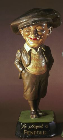 Penfold golfing figurine, 1920s. Creator: Unknown