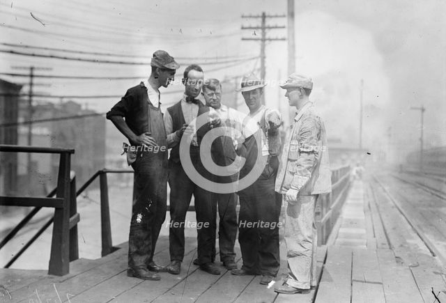 Penn. R.R. [i.e., Railroad] men talk strike, 1910. Creator: Bain News Service.