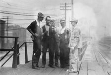 Penn. R.R. [i.e., Railroad] men talk strike, 1910. Creator: Bain News Service