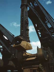 Pennsylvania R.R. ore docks, a "Hulett" ore unloader in operation, Cleveland, Ohio, 1943. Creator: Jack Delano
