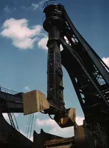 Pennsylvania R.R. ore docks, a "Hulett" unloader in operation, Cleveland, Ohio, 1943. Creator: Jack Delano