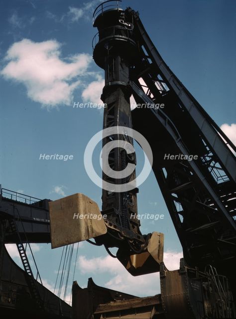 Pennsylvania R.R. ore docks, a "Hulett" unloader in operation, Cleveland, Ohio, 1943. Creator: Jack Delano.