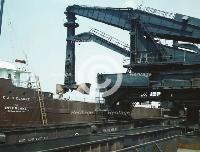 Pennsylvania R.R. ore docks, unloading ore from a lake freighter..., Cleveland, Ohio, 1943. Creator: Jack Delano.
