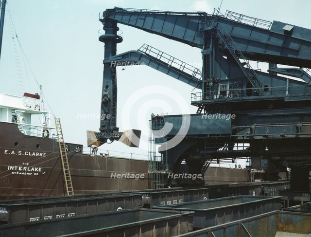 Pennsylvania R.R. ore docks, unloading ore from a lake freighter..., Cleveland, Ohio, 1943. Creator: Jack Delano.