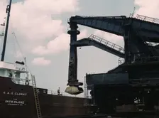 Pennsylvania R.R. ore docks, unloading ore from a lake freighter by means..., Cleveland, Ohio, 1943. Creator: Jack Delano