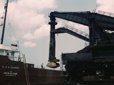 Pennsylvania R.R. ore docks, unloading ore from a lake freighter by means..., Cleveland, Ohio, 1943. Creator: Jack Delano