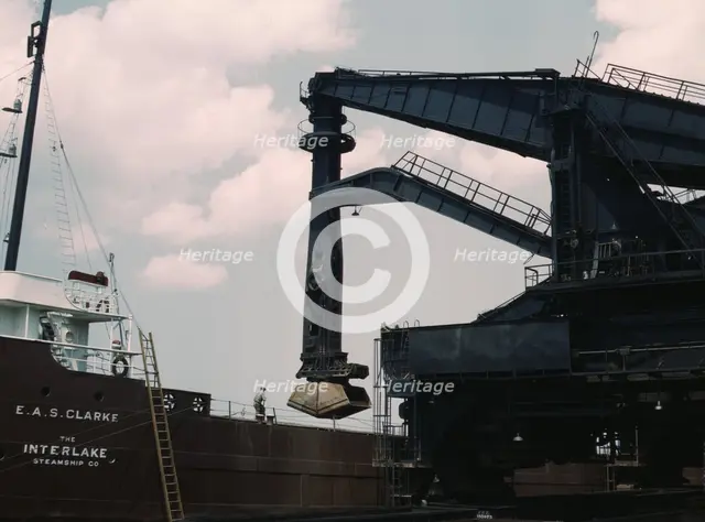 Pennsylvania R.R. ore docks, unloading ore from a lake freighter by means..., Cleveland, Ohio, 1943. Creator: Jack Delano.