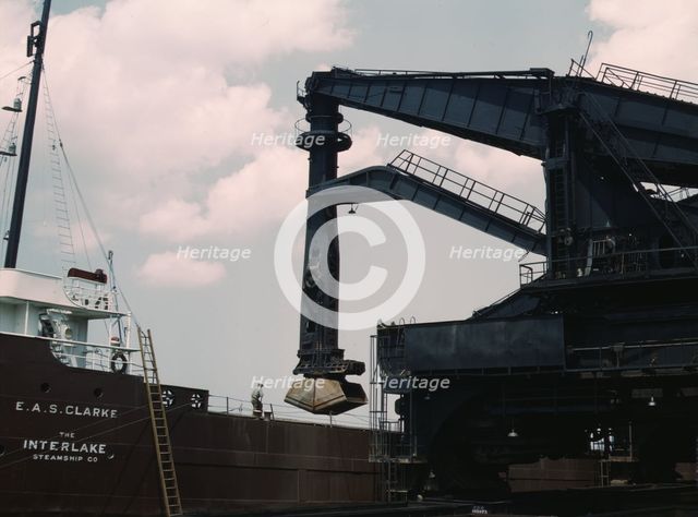 Pennsylvania R.R. ore docks, unloading ore from a lake freighter by means..., Cleveland, Ohio, 1943. Creator: Jack Delano.