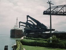 Pennsylvania R.R. [Railroad] ore docks, unloading iron ore from a lake..., Cleveland, Ohio, 1943. Creator: Jack Delano