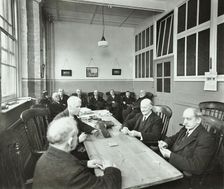 Pensioners playing cards in the Men's Day Room, Lambeth Home for Aged Poor, London, 1935