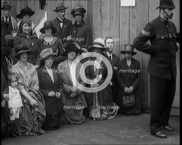People, Mostly Women, Praying in the Street for Irish Peace Conference Success in..., 1922. Creator: British Pathe Ltd.