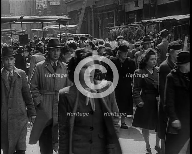 People Moving Along Crowded Streets, 1940. Creator: British Pathe Ltd.