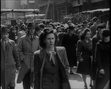 People Moving Along Crowded Streets, 1940. Creator: British Pathe Ltd