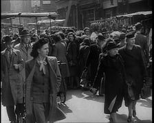 People Moving Along Crowded Streets, 1940. Creator: British Pathe Ltd