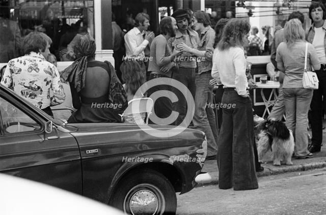 People outside a pub, Battersea, London, 1973. Artist: John Gay