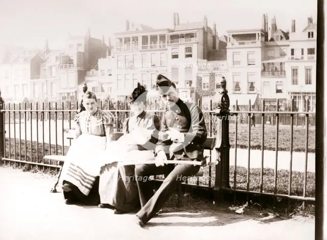 People on a bench, Rotterdam, 1898. Artist: James Batkin