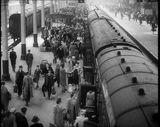 People at a Train Station, 1933. Creator: British Pathe Ltd