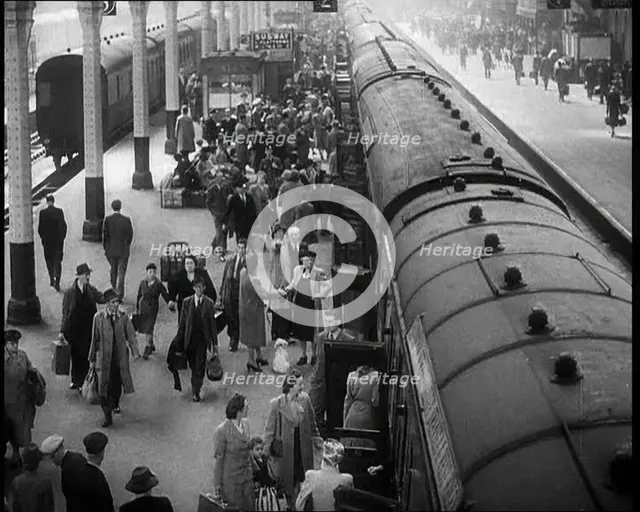 People at  a Train Station, 1933. Creator: British Pathe Ltd.