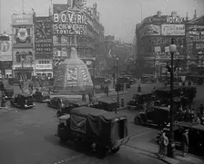 People and Traffic Moving Through a Busy Junction in London, 1943. Creator: British Pathe Ltd