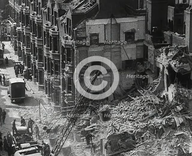 People Clearing Out Bomb Damage , 1942. Creator: British Pathe Ltd.