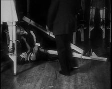 People Dancing on Stilts and Falling Over, 1929. Creator: British Pathe Ltd