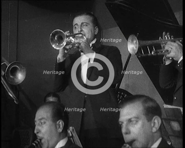 People Dancing to the Sounds of a Jazz Band in a Night Club, 1929. Creator: British Pathe Ltd.
