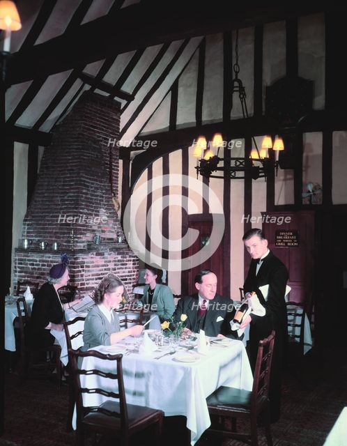 People dining at the Red Lion, Colchester, Essex, c1955-1965. Creator: Arthur Charles Kirby Ware.