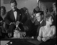 People Drinking Alcohol in Prohibition Era United States of America, 1929. Creator: British Pathe Ltd