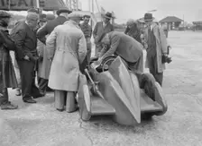 People examining Leon Cushman's Austin 7 racer at Brooklands for a speed record attempt, 1931. Artist: Bill Brunell