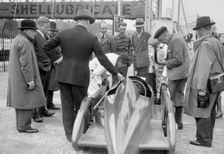People examining Leon Cushman's Austin 7 racer at Brooklands for a speed record attempt, 1931. Artist: Bill Brunell