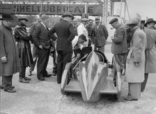 People examining Leon Cushman's Austin 7 racer at Brooklands for a speed record attempt, 1931. Artist: Bill Brunell