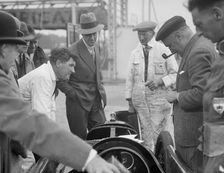 People examining Leon Cushman's Austin 7 racer at Brooklands for a speed record attempt, 1931. Artist: Bill Brunell