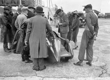 People examining Leon Cushman's Austin 7 racer at Brooklands for a speed record attempt, 1931. Artist: Bill Brunell