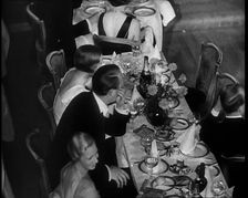 People Eating Dinner, 1930s. Creator: British Pathe Ltd