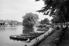 People enjoying a day beside the River Thames at Windsor, Berkshire, c1945-c1965. Artist: SW Rawlings