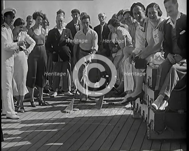 People Enjoying Games on Deck of a Cruise Liner Whilst at Sea, 1931. Creator: British Pathe Ltd.