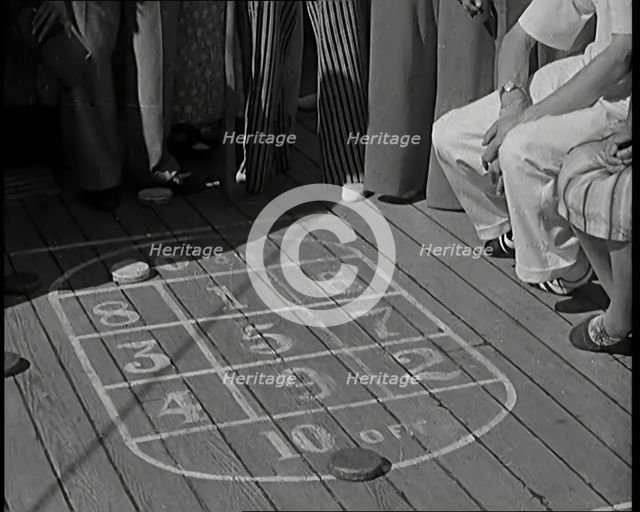 People Enjoying Games on Deck of a Cruise Liner Whilst at Sea, 1931. Creator: British Pathe Ltd.