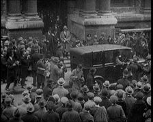 People Gathering and Coming and Going Outside the Carlton Club in London, 1922. Creator: British Pathe Ltd