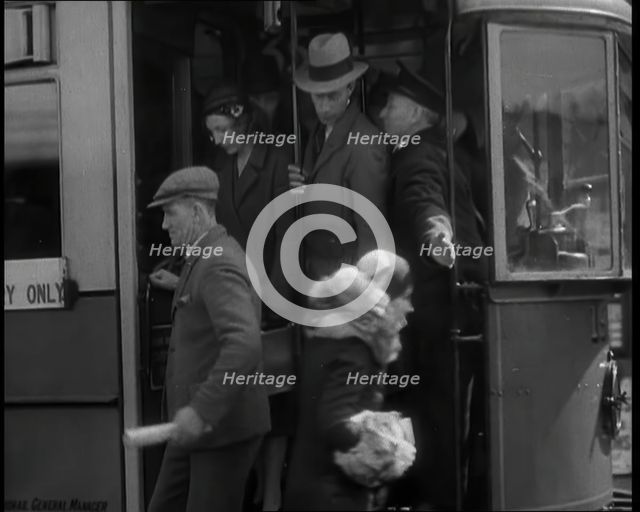 People Getting Off a Tram, 1936. Creator: British Pathe Ltd.