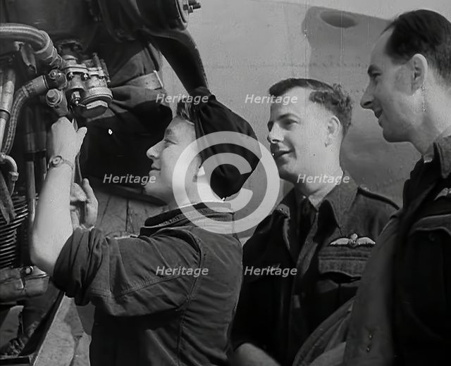 People Inspecting Part of an Aeroplane, 1942. Creator: British Pathe Ltd.