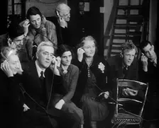 People Listening to Parents Calling Evacuee Children in America Over the Radio, 1940. Creator: British Pathe Ltd