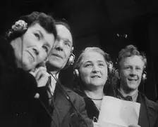 People Listening to Parents Calling Evacuee Children in America Over the Radio, 1940. Creator: British Pathe Ltd
