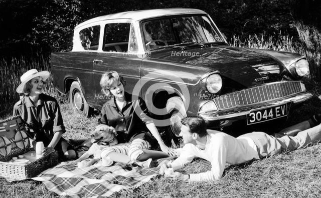 People picnicking with their 1960 Ford Anglia Deluxe, (1960?). Artist: Unknown