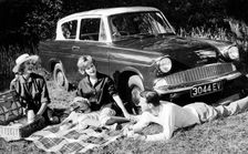 People picnicking with their 1960 Ford Anglia Deluxe, (1960?)