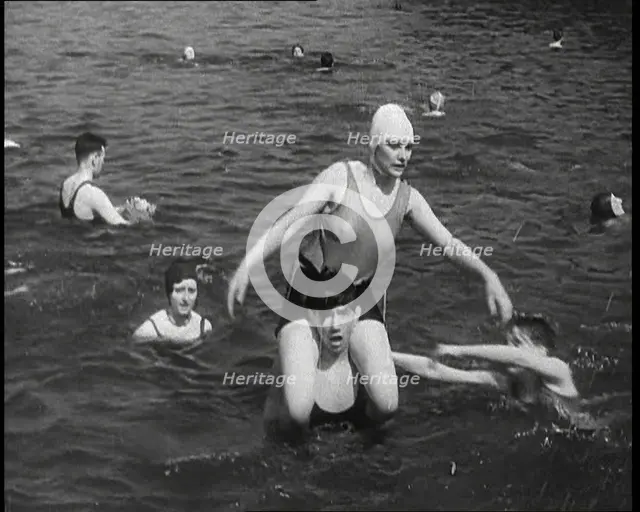 People Playing in the Sea, 1930s. Creator: British Pathe Ltd.