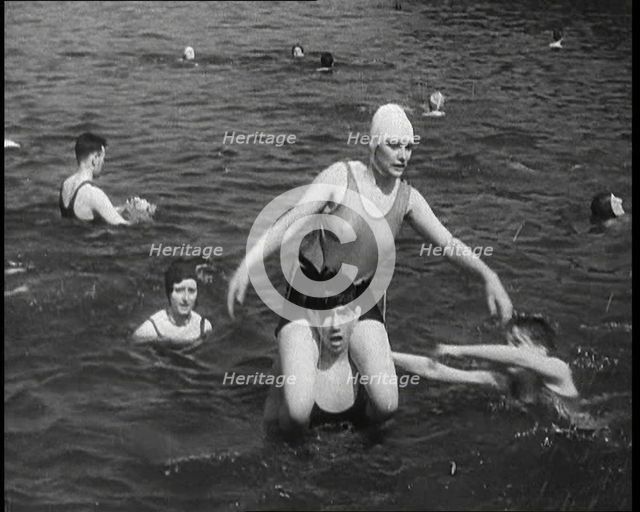 People Playing in the Sea, 1930s. Creator: British Pathe Ltd.