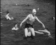 People Playing in the Sea, 1930s. Creator: British Pathe Ltd