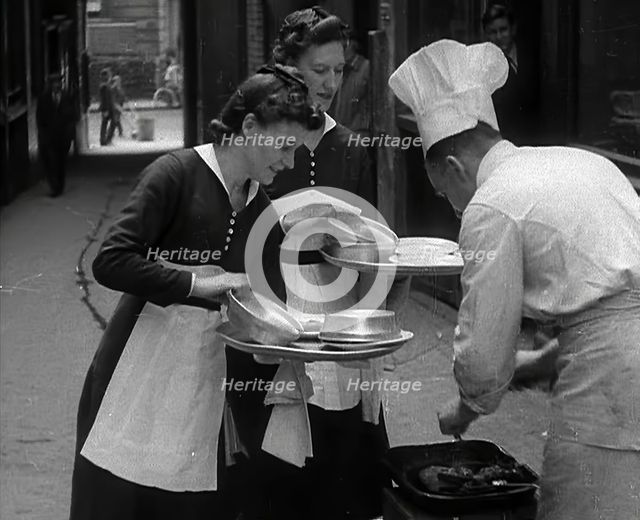 People Preparing Food, 1941. Creator: British Pathe Ltd.