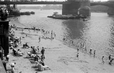 People relaxing on Tower Beach, London, c1945-c1955. Artist: SW Rawlings